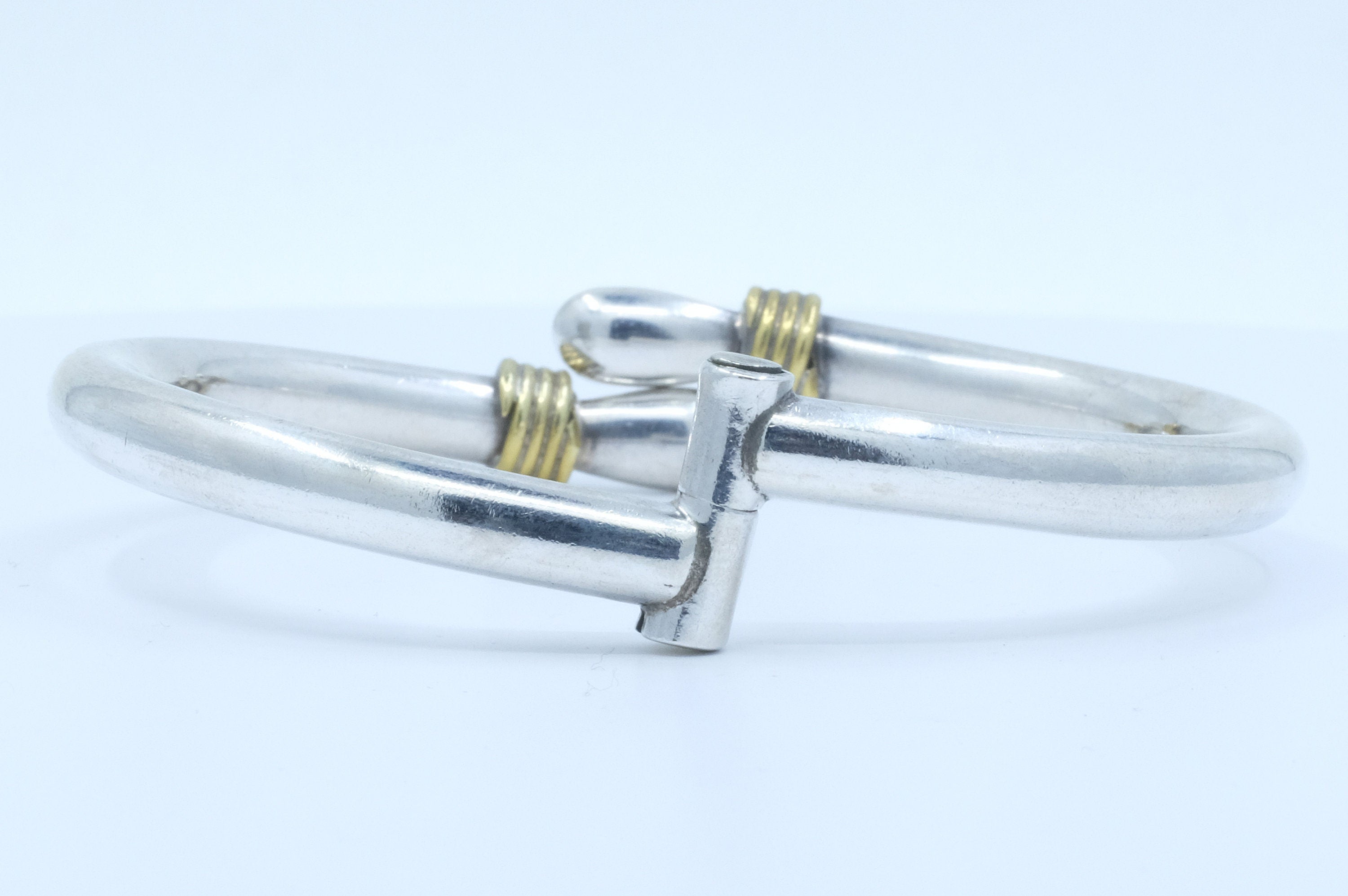 Sterling Silver and Brass Accented Hinged Bangle Bracelet