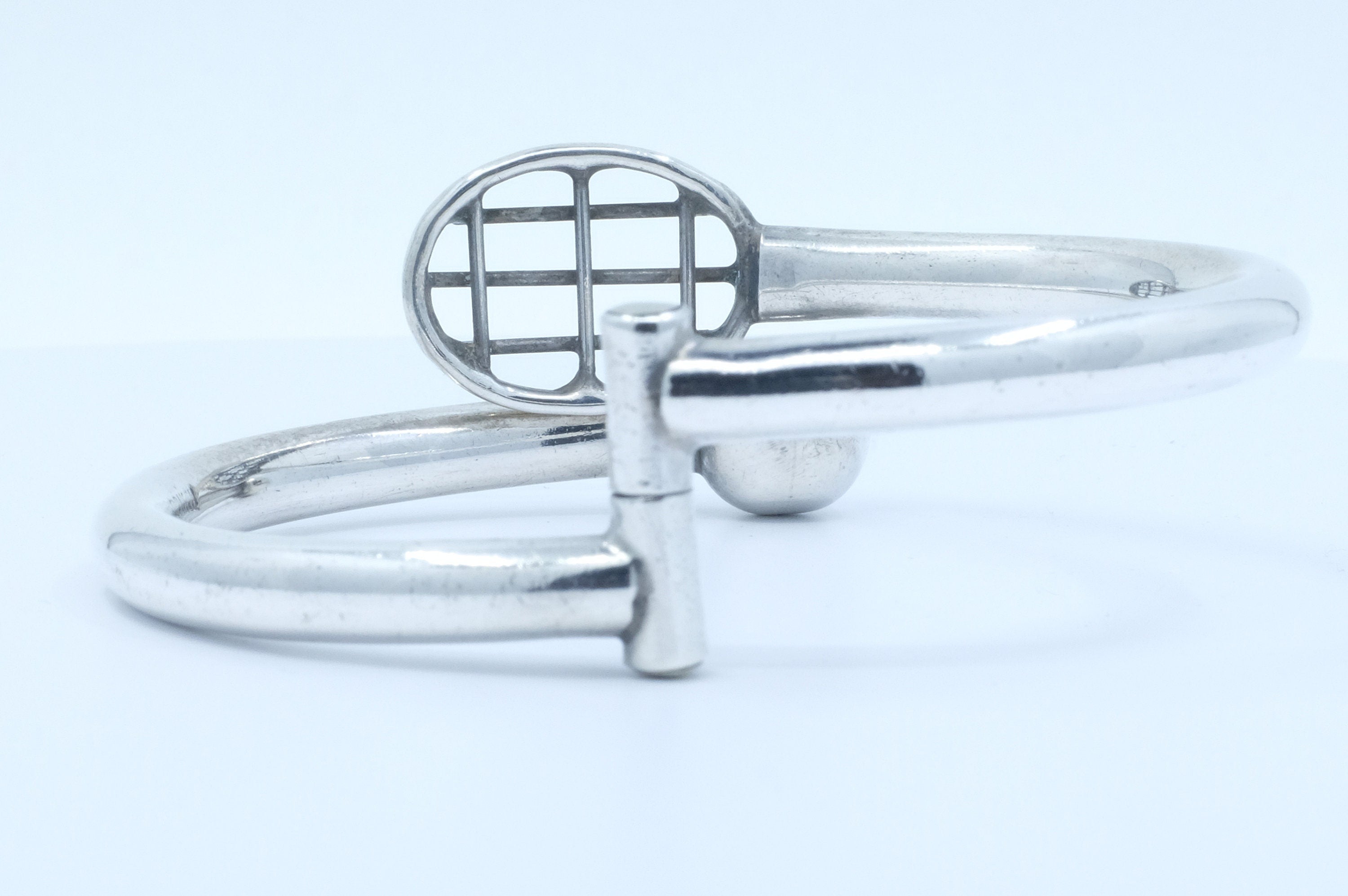 Sterling Silver Tennis Motif Hinged Bangle Bracelet